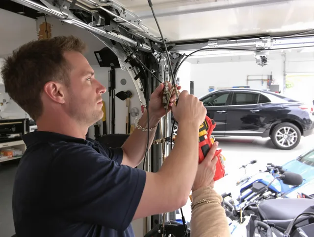 Los Angeles Garage Door Repair safety certified technician performing cable replacement in Los Angeles
