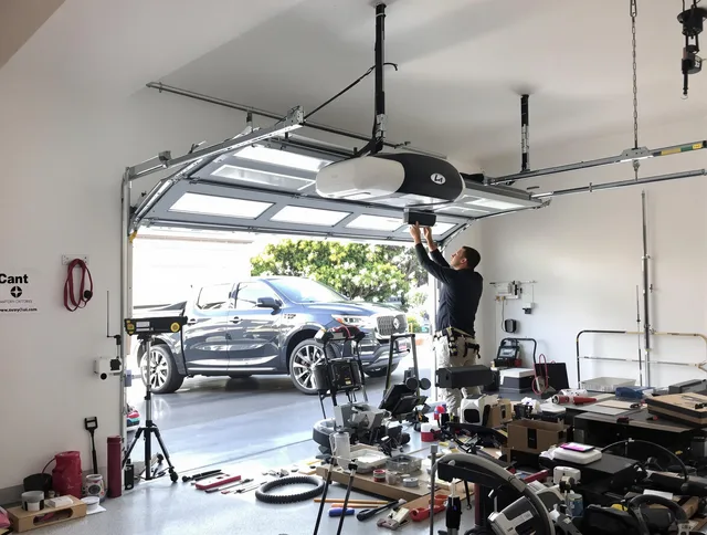 Los Angeles Garage Door Repair specialist installing smart garage door opener system in Los Angeles home