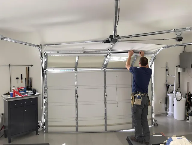 Los Angeles Garage Door Repair specialist performing precise section replacement on Los Angeles garage door